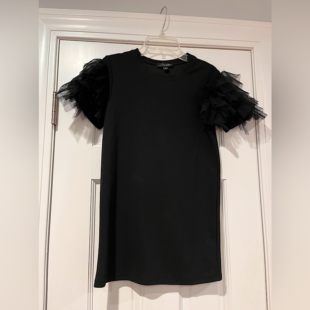 Beautiful, puff short sleeve too. Never worn!! Brand new.